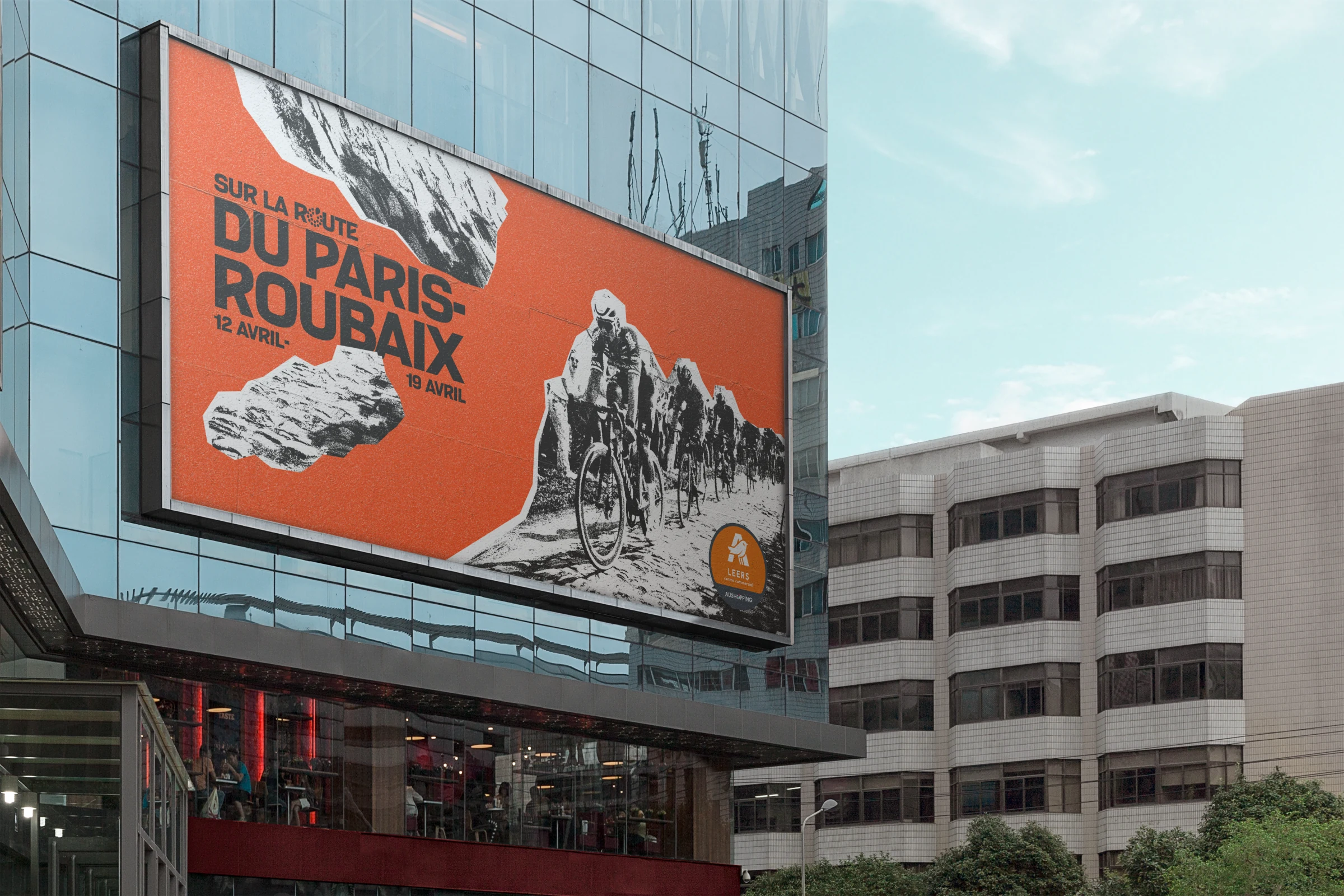 Aushopping, billboard urbain campagne Paris-Roubaix orange dramatique
